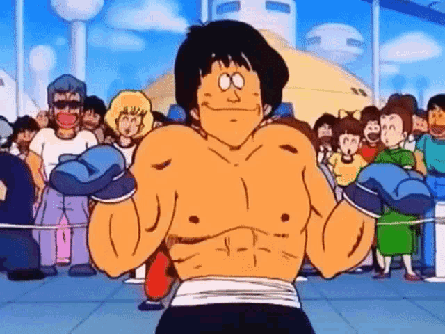 a cartoon character is standing in a boxing ring with boxing gloves .