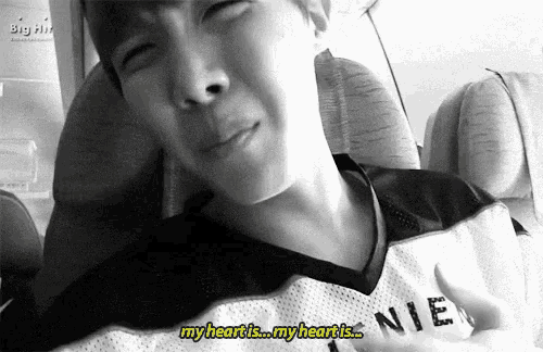 a black and white photo of a person on a plane with the words `` my heart is ... my heart is '' written on the bottom .