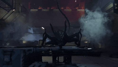 a silhouette of an alien with its mouth open and smoke coming out of it