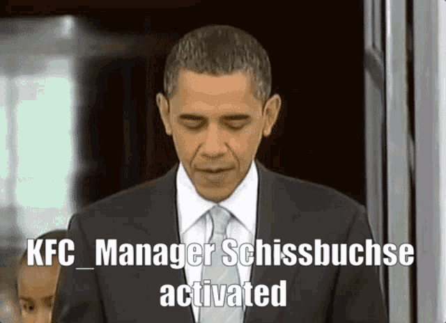 a man in a suit and tie says " kfc manager schissbuchse activated " on the bottom