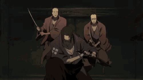a group of men are fighting with swords in a dark room