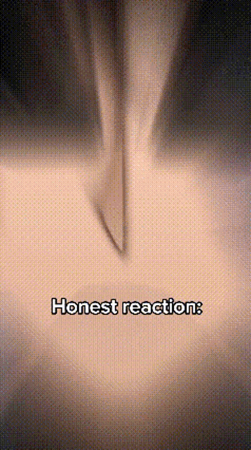 a close up of a knife with the words honest reaction written on it