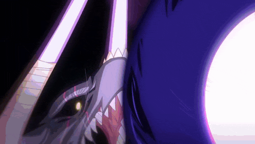 a close up of a person 's face with a shark 's teeth coming out of it 's mouth .