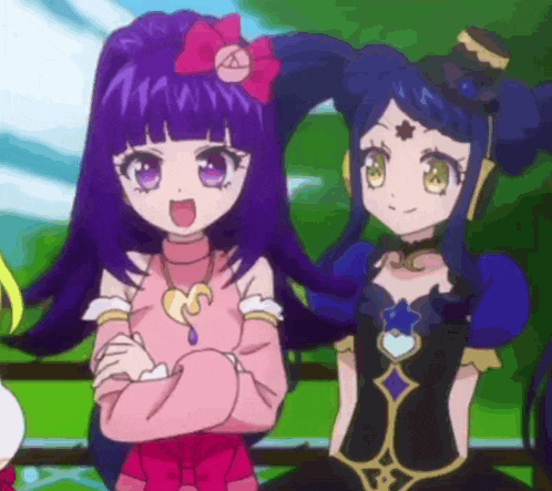 two anime girls standing next to each other with their arms crossed .