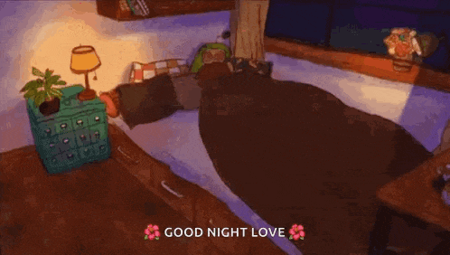 a cartoon of a cat sleeping on a bed with the words `` good night love '' above it .