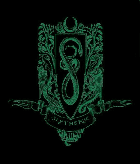 a glow in the dark slytherin crest with a snake on it