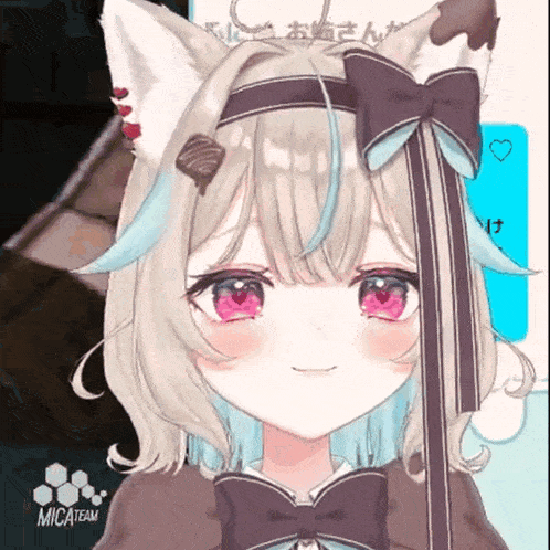 a girl with cat ears and a bow on her head is smiling