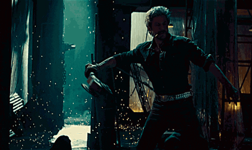 two men are fighting in a dark room with smoke coming out of their mouths