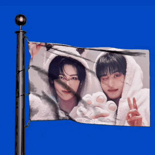 a flag with a picture of a man and a woman on it