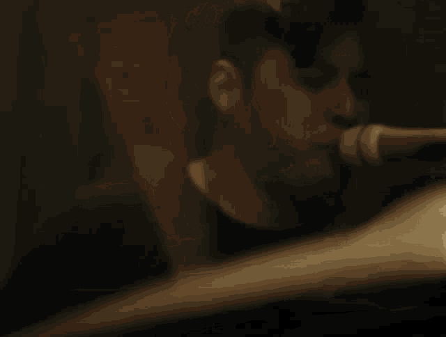 a man is singing into a microphone and the word burn is visible in red