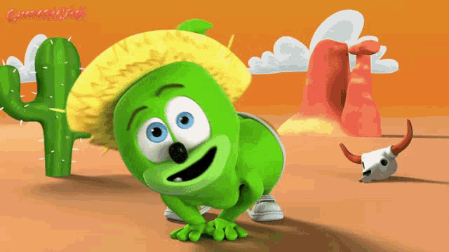 a green gummy bear wearing a sombrero stands in front of a cactus and a bull skull