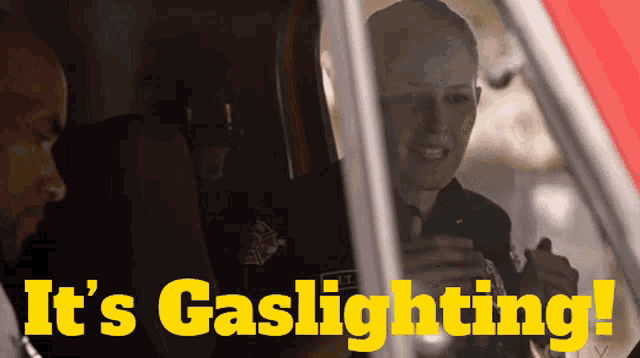 a man and a woman in a car with the words it 's gaslighting above them