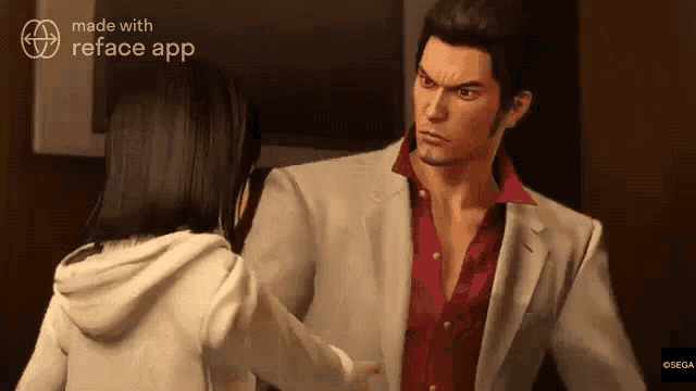 a man in a suit is talking to a woman in a white hoodie ..