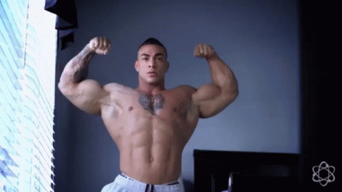 Huge Muscles GIF - Huge Muscles Flex GIFs