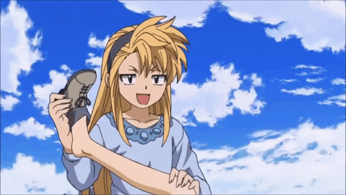 a girl in a blue dress is holding a shoe