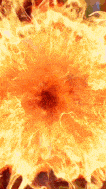 a close up of a large explosion of flames