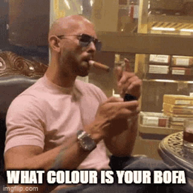 a man smoking a cigar with the caption what color is your bofa