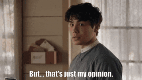 a young man says " but that 's just my opinion " in front of a mailbox