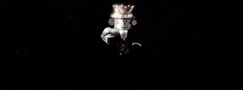 a cartoon character with a crown is laying on a couch