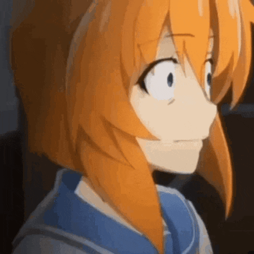 a close up of a person with orange hair and blue eyes .
