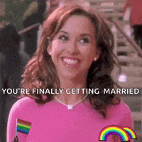 a woman in a pink shirt is smiling with the words you 're finally getting married