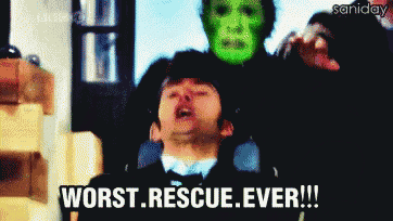 a man in a suit says worst rescue ever in front of a monster
