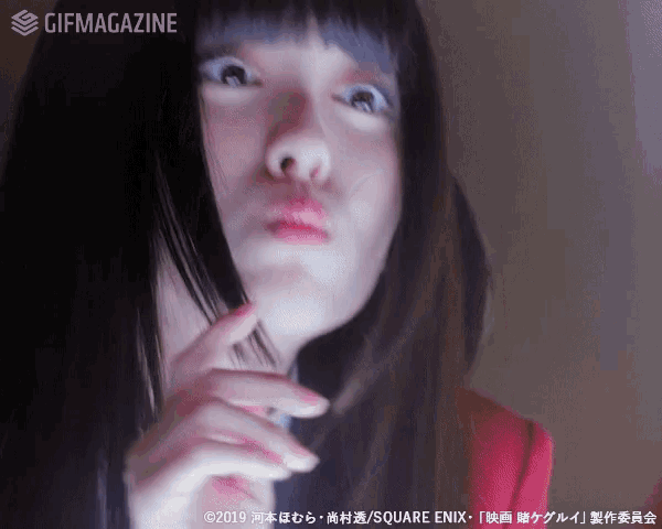 a close up of a woman 's face with a gifmagazine watermark on the bottom