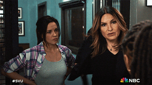 two women standing next to each other with the nbc logo on the bottom right
