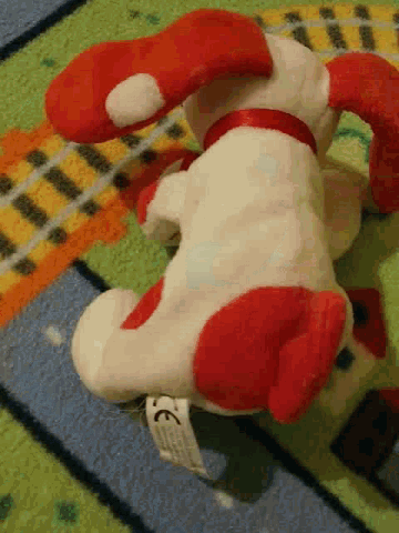 a stuffed animal with a tag that says ce