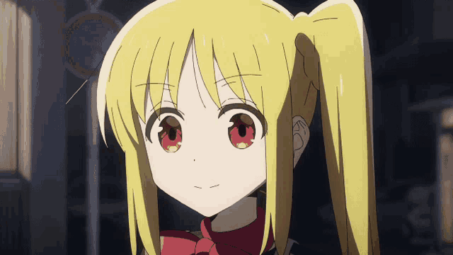 a girl with blonde hair and red eyes is looking at the camera
