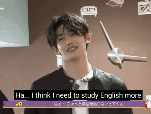 a young man says ha i think i need to study english more in front of a large clock