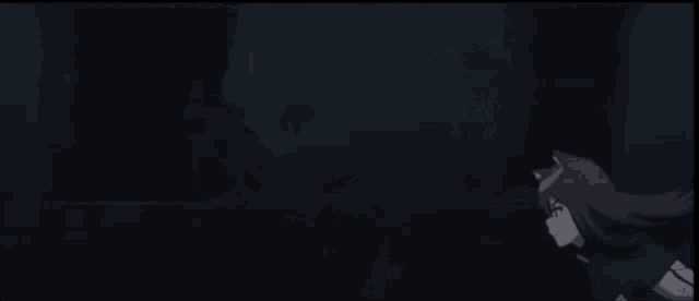 a man and a woman are fighting in a dark room