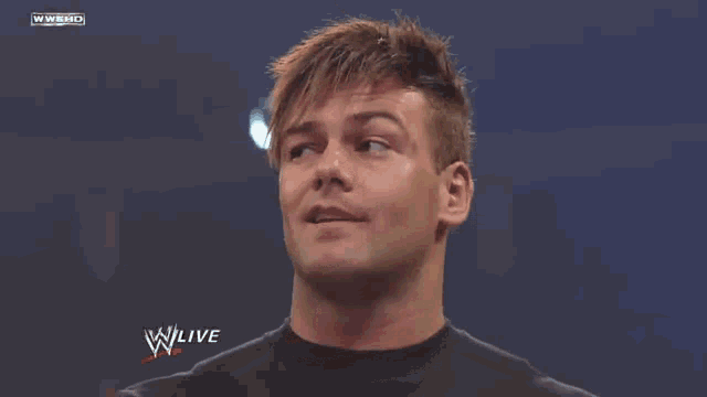 a man with a mohawk is on a wrestling show called wlive