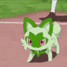 a close up of a green and white cartoon character with red eyes and a blue sky in the background .