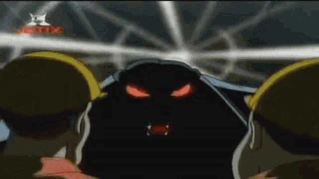 a group of people are standing in front of a cartoon character with red eyes