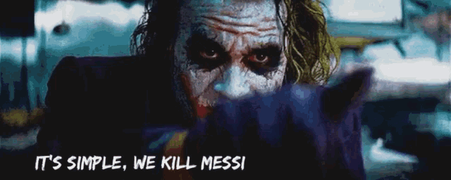 the joker says it 's simple we kill messi while holding a cat