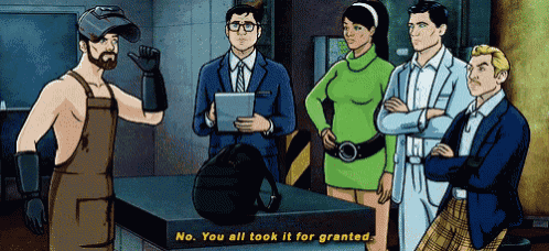 a group of people are standing around a table and one of them says " you all took it for granted "