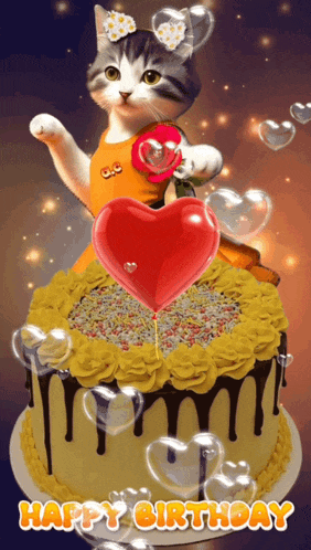 a cat is holding a heart shaped balloon on top of a birthday cake that says happy birthday