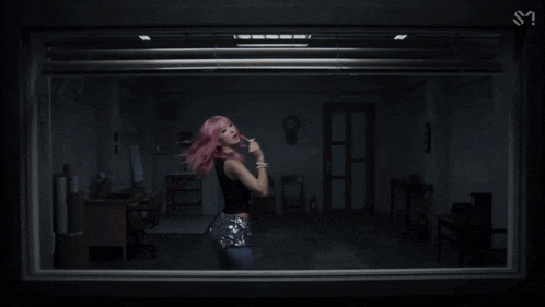 a woman with pink hair is wearing a black tank top that says ' i love you ' on it