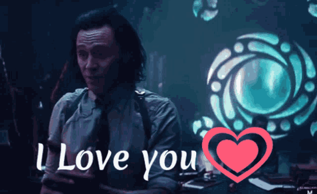 a man in a suit says i love you next to a heart