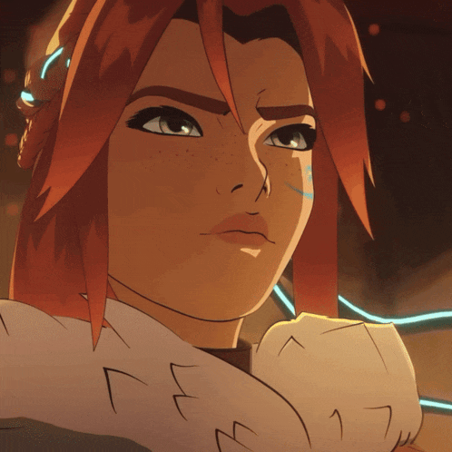 a close up of a woman 's face with red hair