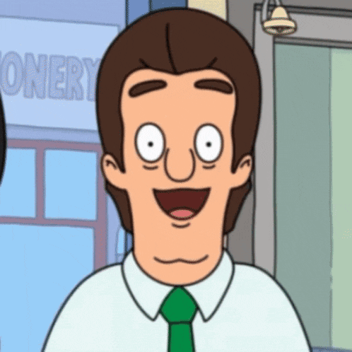 a man in a green tie is smiling in front of a sign that says stationery