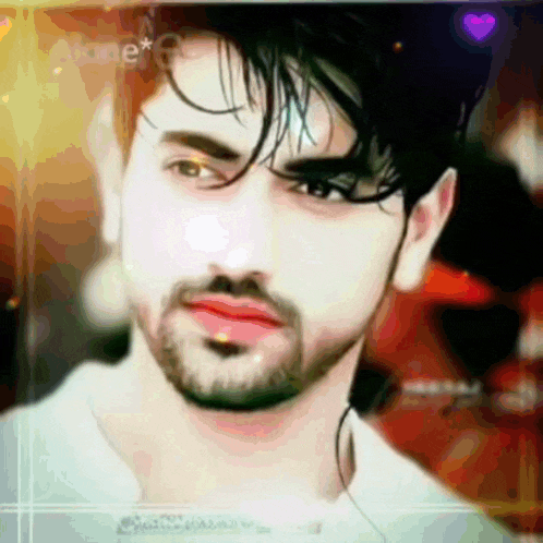 a man with a beard and red lips looks at the camera with a heart in the background
