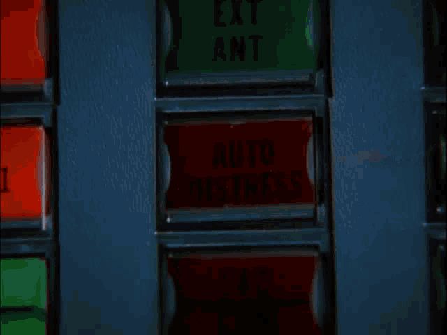 a person is pressing a red button that says a distance