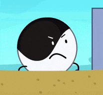 a black and white cartoon character with a sad face is standing in the sand