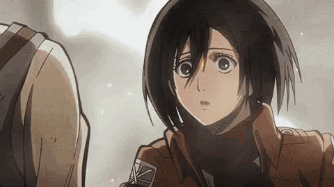 a girl with a scarf around her neck looks at a man