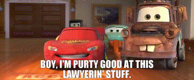 lightning mcqueen and mater from cars are standing next to each other in a garage