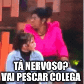 a woman in a pink shirt is sitting next to a little girl and says ta nervoso vai pescar colega .