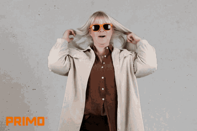 a woman wearing sunglasses with the word yesss in orange letters