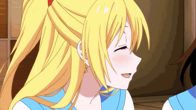 a close up of a girl 's face with a ponytail